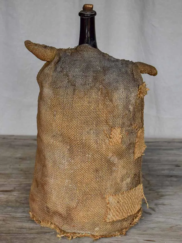 Antique French carboy in jute