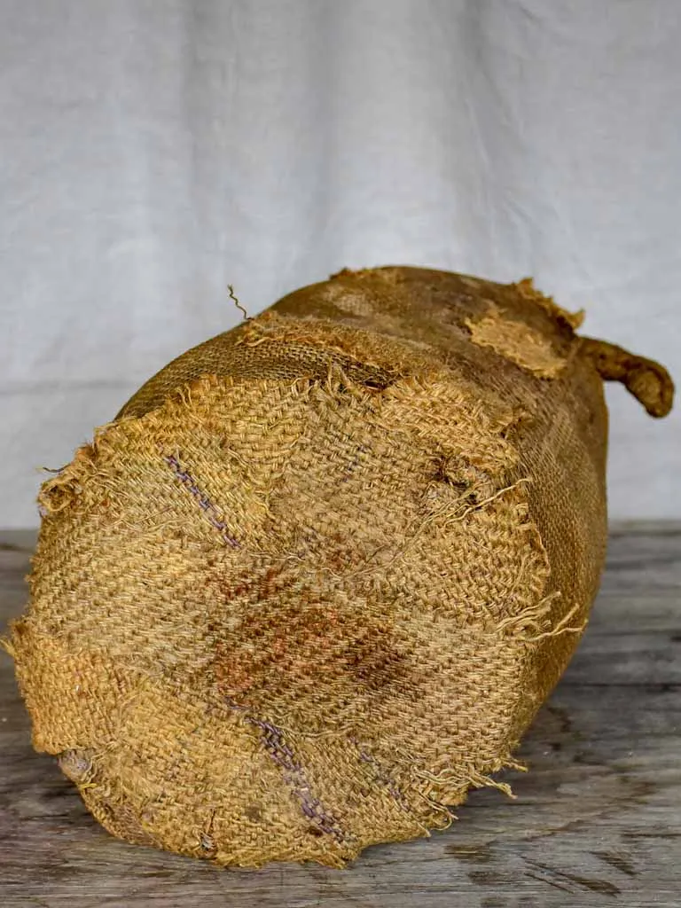 Antique French carboy in jute