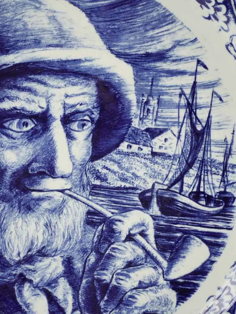 Blue & white Delft plate w/ bearded man smoking 13¾"